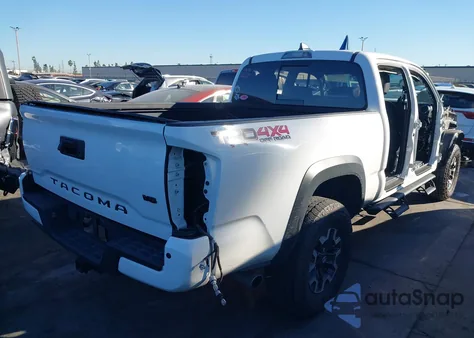 2022 Toyota Tacoma Trd Off Road z USA, uszkodzony, nr VIN 3TMDZ5BN2NM121260